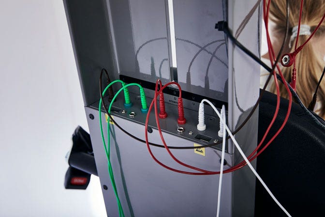Orion Auto-Traverse viewed from behind, showing built-in preamplifier with plugs inserted