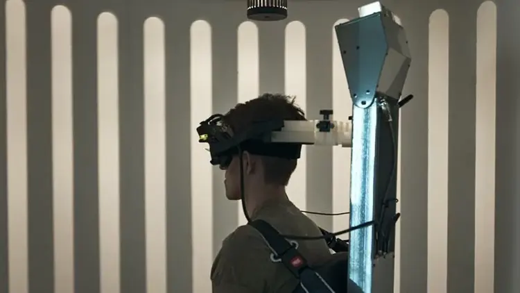 Young male patient performing optokinetic testing in Orion Auto-Traverse chair