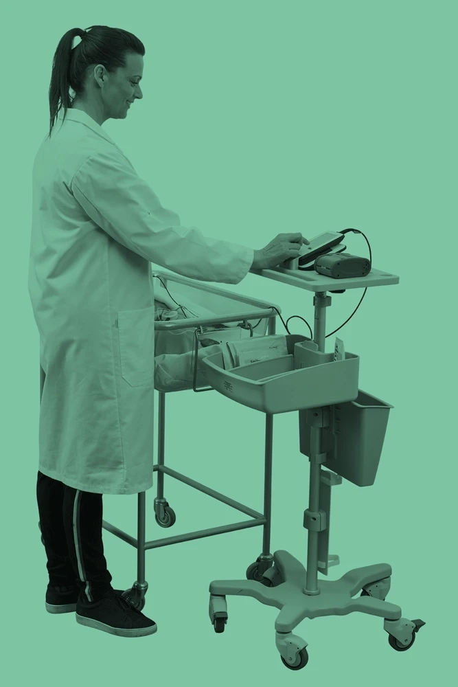 Female clinician operating the Sera on Sera Transport Cart
