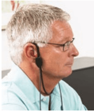 Middle-aged man with REM headband placed on his right ear.