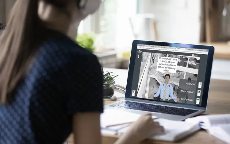 Audiologist reviewing a virtual patient case in the Virtual Clinic