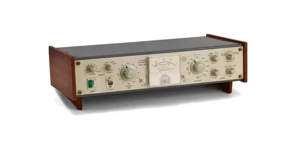 The first Interacoustics audiometer in its brown wooden case