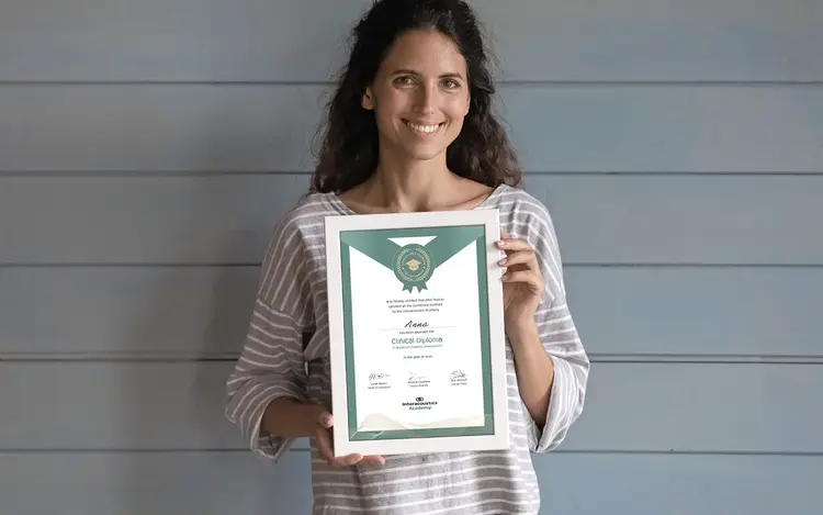 Clinician working through a Clinical Diploma module on screen
