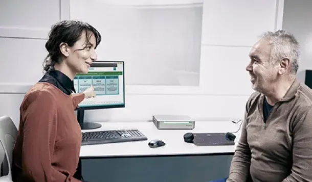 Clinician performing an Audible Contrast Threshold (ACT) test