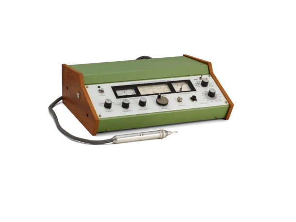 The AZ2 impedance audiometer with wooden side panels and its probe