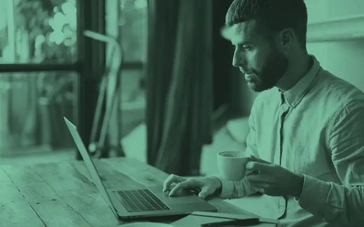 Hearing care professional taking an Interacoustics Academy online course on a laptop