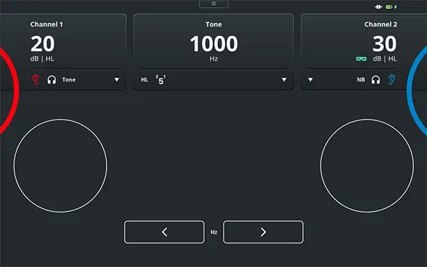 Pure tone audiometry test screen with the Touch Keyboard. For channels 1 and 2, it is possible to change the stimulus level and type. The frequency is displayed toward the top, with buttons below to decrease or increase the frequency