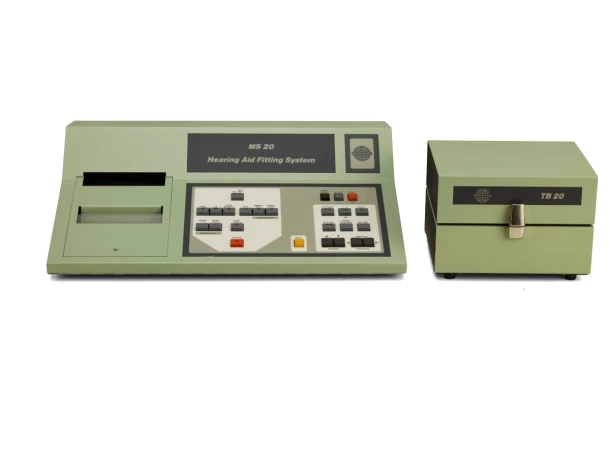 The MS20 hearing aid fitting system in its green and beige casing