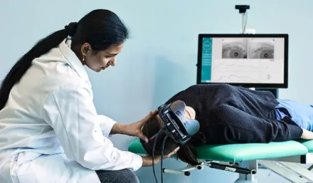Clinician reviewing BPPV vestibular test results
