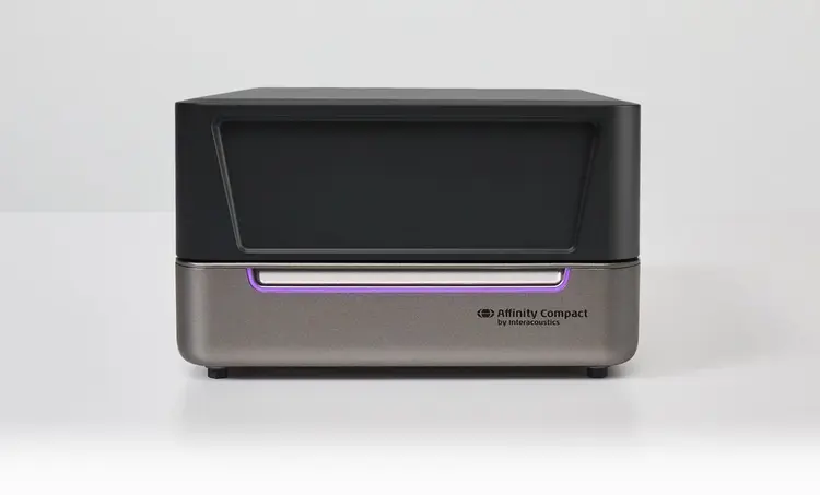 Version four of Affinity Compact. Closed test box with a purple light on the front of the unit.